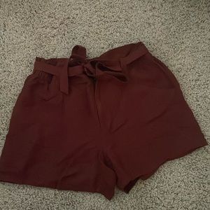 Burnt orange cargo shorts that are brand new without tags